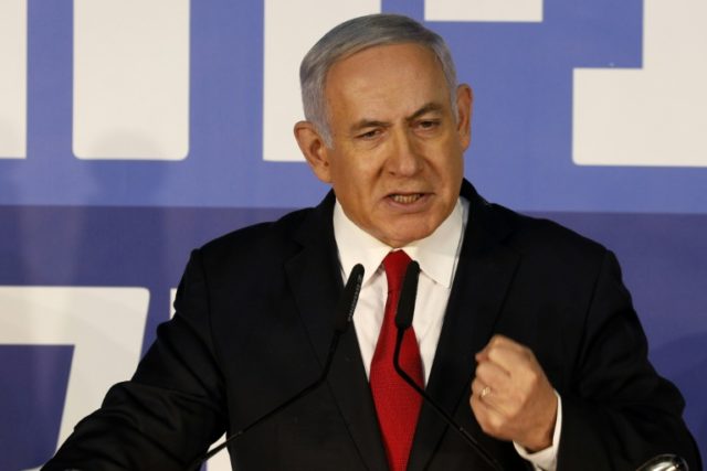 Netanyahu defiant after decision to indict him ahead of polls