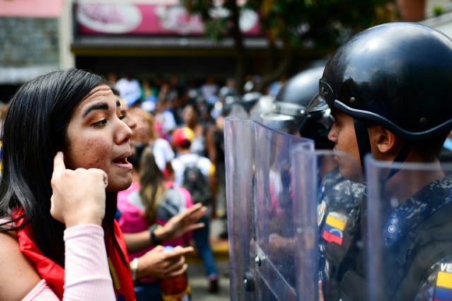 Police block opposition protesters as tensions rise in Venezuela