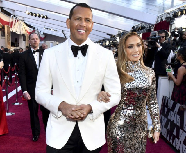 People Jennifer Lopez Alex Rodriguez, Jennifer Lopez In this Sunday, Feb. 24, 2019, file photo, Alex Rodriguez, left, and Jennifer Lopez arrive at the Oscars at the Dolby Theatre in Los Angeles. Rodriguez and Lopez are engaged. The couple posted an Instagram photo of their hands with a massive engagement ring on Lopez’s ring finger. (Photo by Charles Sykes/Invision/AP, File) The Associated Press