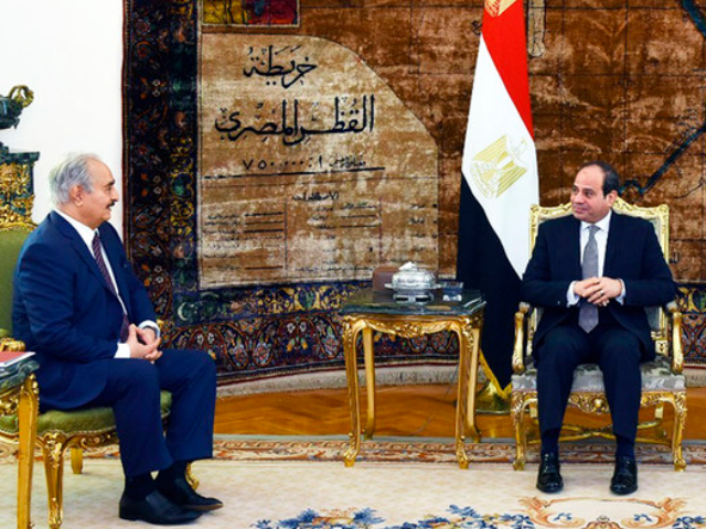 Egyptian President Abdel-Fattah El-Sissi, right, meets with the head of the self-styled Li