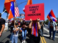 Thousands of people of Armenian descent and their supporters march through Little Armenia