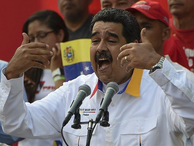Venezuelan President Nicolas Maduro delivers a speech during a pro-government demonstration in Caracas on March 23, 2019. - It is two months since Juan Guaido has asserted he is Venezuela's interim president. Domestically, he has been unable to shake President Nicolas Maduro from power. (Photo by Juan BARRETO / AFP) …