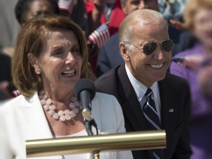 Vice President Joe Biden greets Senate Minority Leader Harry Reid of Nev. as House Minorit