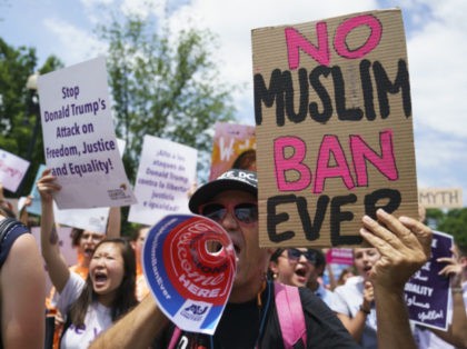 FILE - In this June 26, 2018, file photo, protesters call out against the Supreme Court ruling upholding President Donald Trump's travel ban outside the Supreme Court on Capitol Hill in Washington. Trump’s so-called “travel ban,” stops most visas for residents of mostly Muslim Libya, Iran, Somalia, Syria and Yemen, …