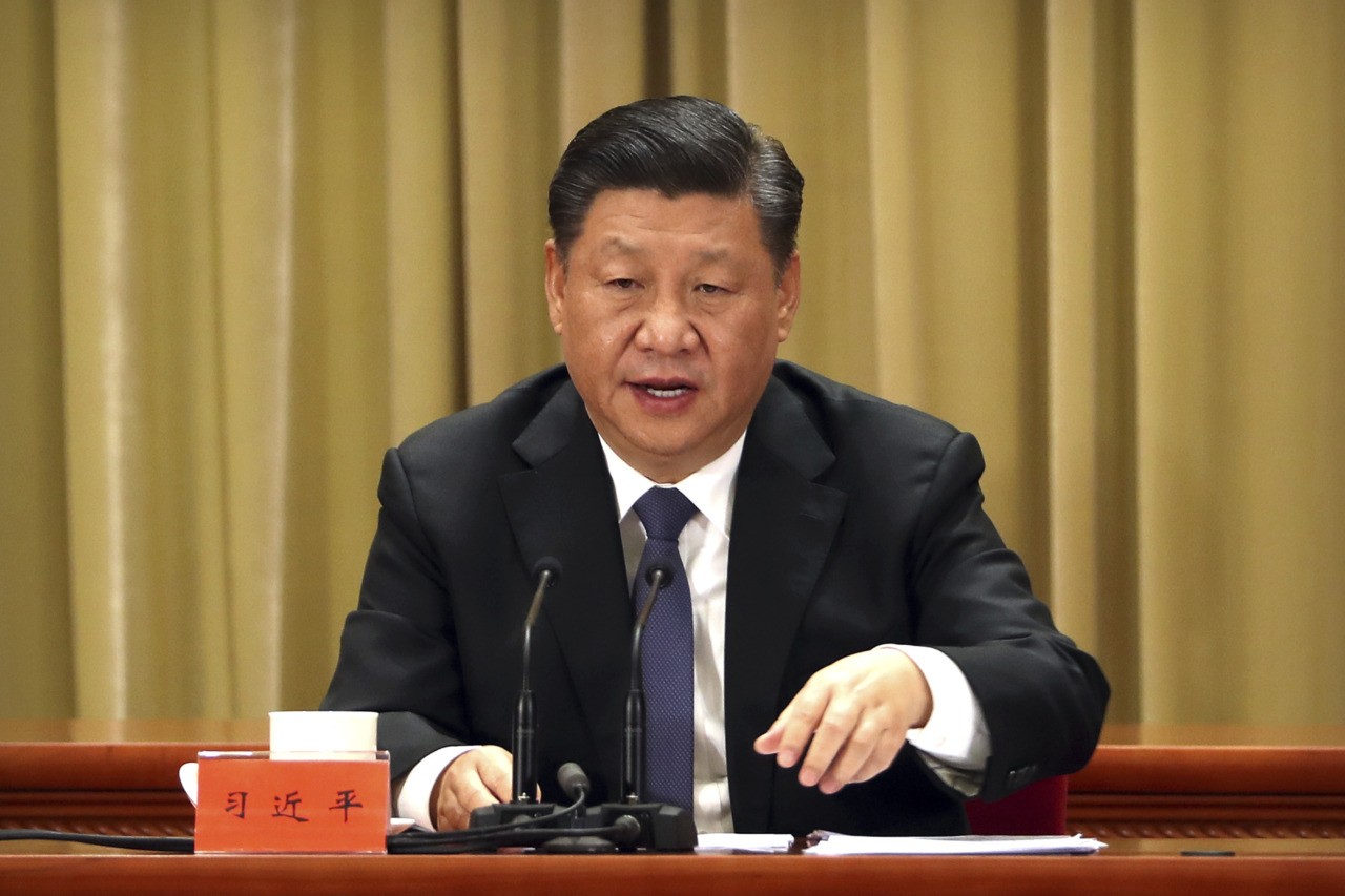 Chinese President Xi Jinping speaks during an event to commemorate the 40th anniversary of the Message to Compatriots in Taiwan at the Great Hall of the People in Beijing, Wednesday, Jan. 2, 2019. Xi urged both sides to reach an early consensus on the unification of China and Taiwan and not leave the issue for future generations. (AP Photo/Mark Schiefelbein, Pool)