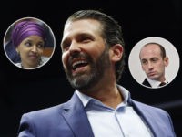 Donald Trump Jr. takes video of the crowd during a rally in Grand Rapids, Mich., Thursday, March 28, 2019. (AP Photo/Paul Sancya)