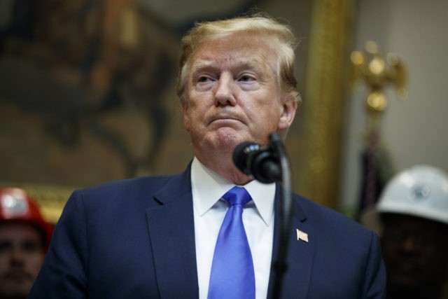President Donald Trump pauses during remarks on the deployment of 5G technology in the United States during an event in the Roosevelt Room of the White House, Friday, April 12, 2019, in Washington. (AP Photo/Evan Vucci)