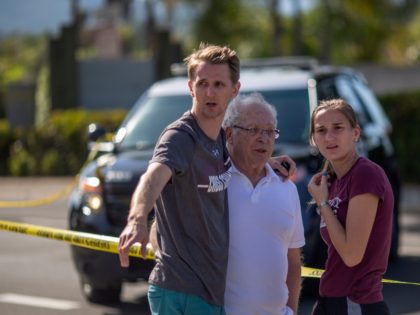 POWAY, CA - APRIL 27: People embrace outside the Congregation Chabad synagogue on April 27, 2019 in Poway, California. A gunman opened fire at the synagogue on the last day of Passover leaving one person dead and three others injured. The suspect is in custody. (Photo by David McNew/Getty Images)