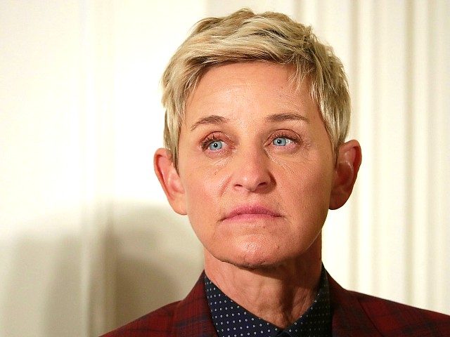 WASHINGTON, DC - NOVEMBER 22: Comedian and talk show host Ellen DeGeneres listens to Presi