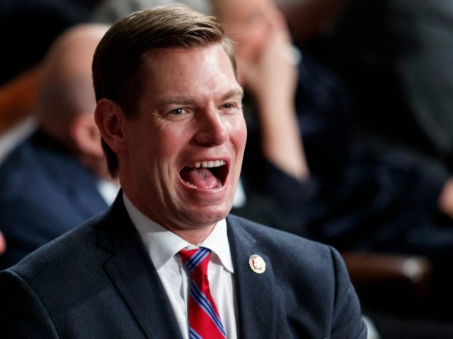 Rep. Eric Swalwell, D-Calif., stands on the House Floor at the Capitol in Washington, Thur