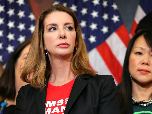 WASHINGTON, DC - JANUARY 08: Founder of Moms Demand Action for Gun Sense founder Shannon Watts joins other gun safety advocates for a news conference to introduce legislation to expand background checks for firearm sales in the Rayburn Room of the U.S. Capitol January 08, 2019 in Washington, DC. Eight …