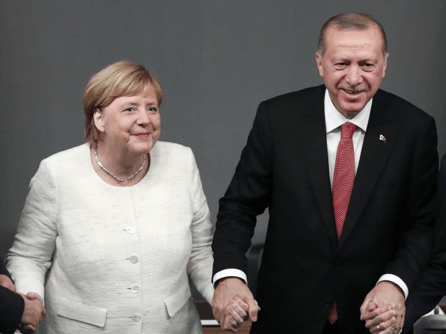 (From L) Russian President Vladimir Putin, German Chancellor Angela Merkel, Turkish Presid