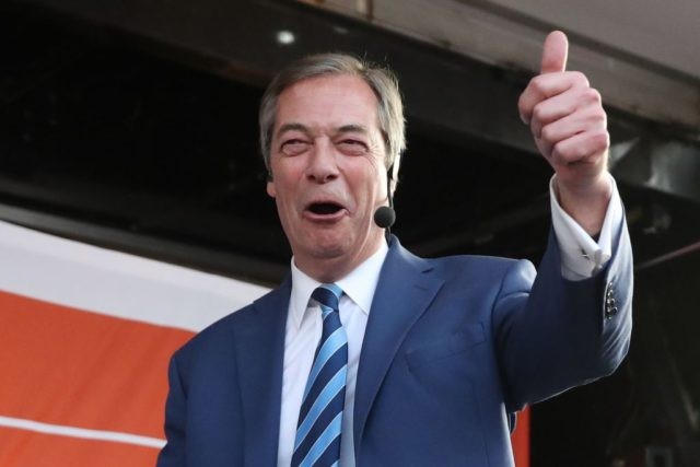 Former UK Independence Party (UKIP) leader, Brexit campaigner and member of the European Parliament Nigel Farage speaks at a pro-Brexit rally in central London on March 29, 2019, organised by Leave Means Leave. - British MPs on Friday rejected Prime Minister Theresa May's EU divorce deal for a third time, …