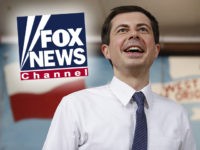 (INSET: Fox News logo) South Bend Mayor and Democratic presidential candidate Pete Buttigieg speaks at the West Side Democratic Club during a Dyngus Day celebration event on Monday, April 22, 2019 in South Bend, Indiana. - Buttigieg, the gay, liberal mayor of a small American city in the conservative bastion …