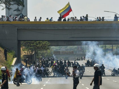 Opposition demonstrators clashes with soldiers loyal to Venezuelan President Nicolas Madur