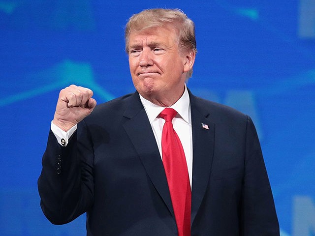 INDIANAPOLIS, INDIANA - APRIL 26: US President Donald Trump gestures to guests at the NRA-