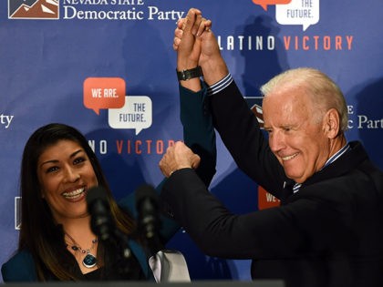 LAS VEGAS, NV - NOVEMBER 01: Democratic candidate for lieutenant governor and current Nevada Assemblywoman Lucy Flores (D-Las Vegas) (L) introduces U.S. Vice President Joe Biden at a get-out-the-vote rally at a union hall on November 1, 2014 in Las Vegas, Nevada. Biden is stumping for Nevada Democrats ahead of …