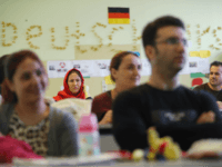 BERLIN, GERMANY - NOVEMBER 11: Recently-arrived immigrants, including from countries such as Iraq, Afghanistan and Iran, attend a first orientation class for asylum applicants whose chances of receiving longer-term asylum are slim at a classroom of the Johanniter charity on November 11, 2016 in Berlin, Germany. Germany has taken in …