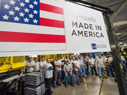 Workers at the Hollywood Bed Frame Company attend an event to mark the company's upcoming