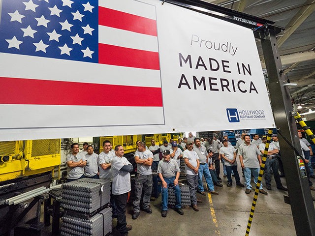 Workers at the Hollywood Bed Frame Company attend an event to mark the company's upcoming expansion which will double the manufacturer's workforce, adding 100 new local jobs, at the company's factory in Commerce, California, seven miles (11 km) southeast from downtown Los Angeles, April 14, 2017. Hollywood Bed Frame says …