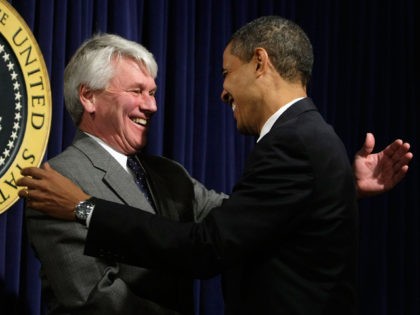 WASHINGTON - JANUARY 21: U.S. President Barack Obama (R) greets White House counsel Gregor