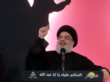 Hassan Nasrallah, the head of Lebanon's militant Shiite Muslim movement Hezbollah, speaks during a ceremony on the eve of the tenth day of the mourning period of Muharram, which marks the day of Ashura, in a southern suburb of the capital Beirut on October 11, 2016. Ashura mourns the death …