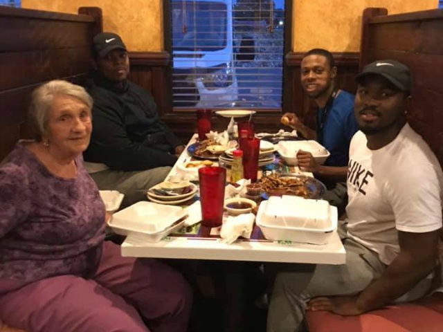 Jamario Howard and his friends invited an elderly woman to eat with them at Brad’s Bar-B