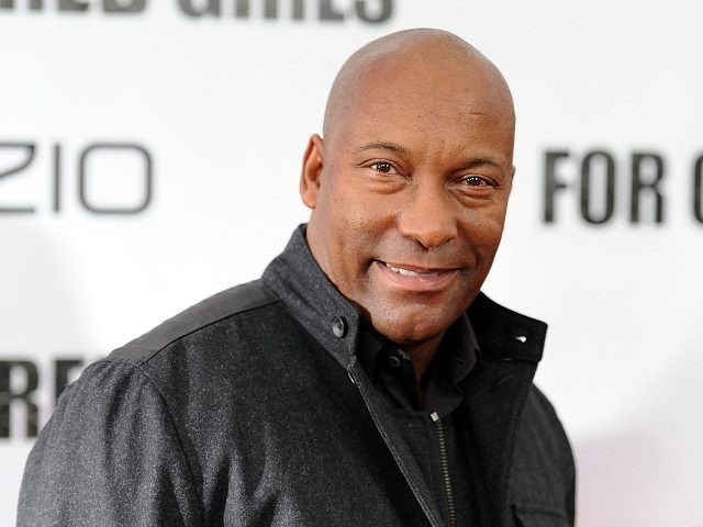NEW YORK - OCTOBER 25: John Singleton attends the premiere of "For Colored Girls" at Ziegfeld Theatre on October 25, 2010 in New York City. (Photo by Stephen Lovekin/Getty Images)