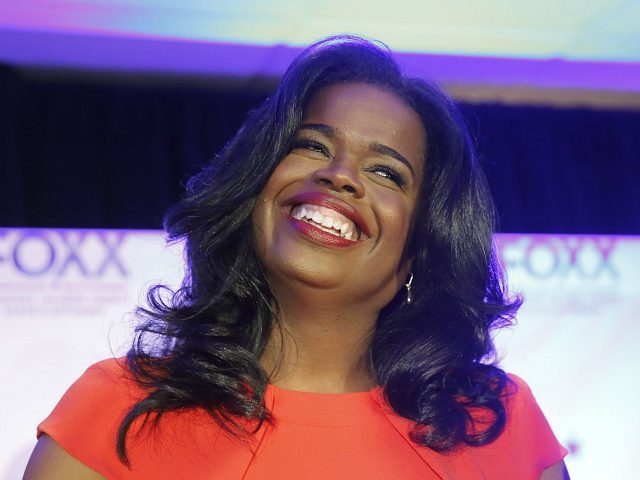 FILE--In this March 15, 2016, file photo, Kim Foxx smiles at the crowd as she celebrates h