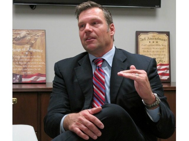 In this Oct. 16, 2017, file photo, Kansas Secretary of State Kris Kobach answers questions about his run for the Republican nomination for governor during an interview at the Johnson County Republican Party's headquarters in Overland Park, Kan. Attacks on Kobach by the American Civil Liberties Union in the Kansas …