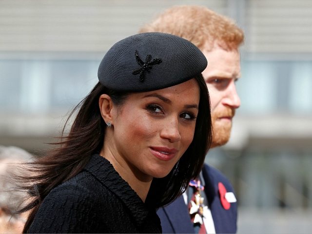 Britain's Prince Harry (R) and his US fiancee Meghan Markle arrive to attend a service of commemoration and thanksgiving to mark Anzac Day in Westminster Abbey in London on April 25, 2018. - Anzac Day marks the anniversary of the first major military action fought by Australian and New Zealand …