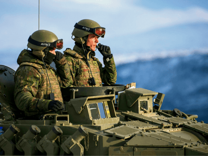 Spanish soldiers in an Pizarro tank during an exercise to capture an airfield as part of the Trident Juncture 2018, a NATO-led military exercise, on November 1, 2018 near the town of Oppdal, Norway. - Trident Juncture 2018, is a NATO-led military exercise held in Norway from 25 October to …
