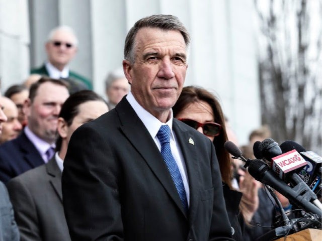 Vermont Republican Gov. Phil Scott pauses while speaking before signing the first significant gun restrictions bills in the states history during a ceremony on the steps of the Statehouse in Montpelier, VT, Wednesday, April 11, 2018. (AP Photo/Cheryl Senter)