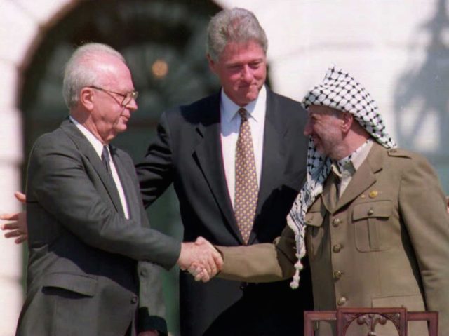 Rabin Clinton Arafat (FILES/J. David AKE/AFP/Getty Images)