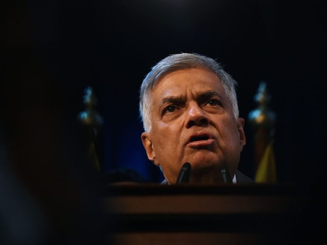Sri Lanka's Prime Minister Ranil Wickremesinghe speaks to supporters at the prime minister