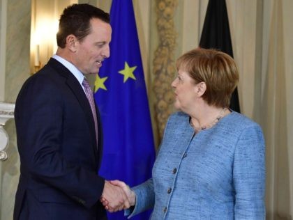 Richard Grenell and Angela Merkel (Tobias Schwarz / AFP / Getty)