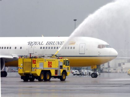 AUCKLAND, NEW ZEALAND - OCTOBER 28: The Royal Brunei Airlines aircraft gets a water send off from two fire trucks as it departs Auckland International Airport, Tuesday. (Photo by Dean Purcell/Getty Images)