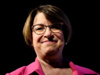 Senator Amy Klobuchar (D-MN), a 2020 US presidential hopeful, pauses while speaking during the 'We the People' gathering at the Warner Theatre on April 1, 2019, in Washington, DC. (Photo by Brendan Smialowski / AFP) (Photo credit should read BRENDAN SMIALOWSKI/AFP/Getty Images)