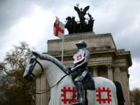 LONDON, ENGLAND - APRIL 22: A 15 foot high statue of St George astride a horse is unveiled at Wellington Arch on April 22, 2015 in London, United Kingdom. The statue's unveiling marks the launch of a nationwide tour to celebrate St George's Day and will see the knight open …