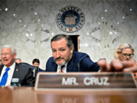 Subcommittee Chairman Ted Cruz, R-Texas, center, accompanied by Chairman Roger Wicker, R-Miss., left, and subcommittee Ranking Member Kyrsten Sinema, D-Ariz., right, arrives as National Transportation Safety Board Chairman Robert Sumwalt, Department of Transportation Inspector General Calvin Scovel, and Federal Aviation Administration Acting Administrator Daniel Elwell appear before a Senate Transportation …