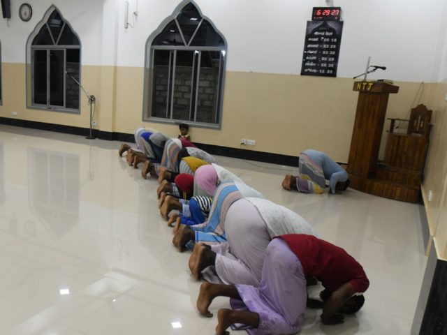 In this picture taken on April 25, 2019, Sri Lankan Muslim men pray at the National Thowheeth Jama'ath (NTJ) mosque in Kattankudy. - Zahran Hashim's sword-wielding zealotry fuelled fears in the sleepy east coast town of Kattankudy long before the cleric became Sri Lanka's most wanted man over the horrific …