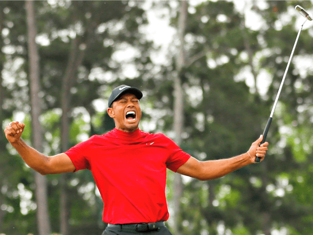AUGUSTA, GEORGIA - APRIL 14: Tiger Woods of the United States celebrates after sinking his