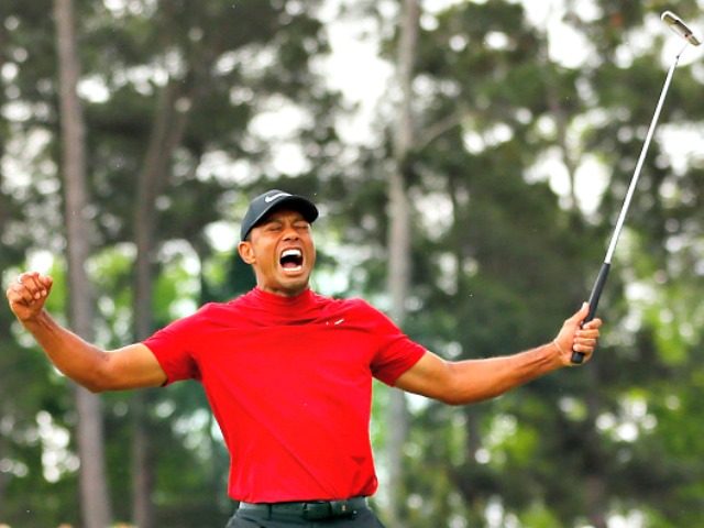 AUGUSTA, GEORGIA - APRIL 14: Tiger Woods of the United States celebrates after sinking his