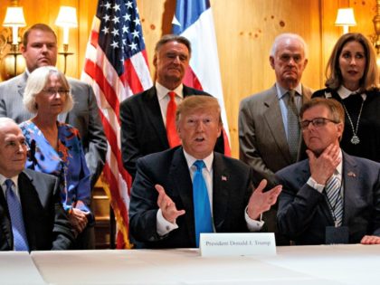President Donald Trump speaks with reporters about border policy during a fundraising event, Wednesday, April 10, 2019, in San Antonio. (AP Photo/Evan Vucci)