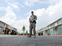 A US soldier stands in front of the housing buiding at the new European headquarters of the US Army Europe.