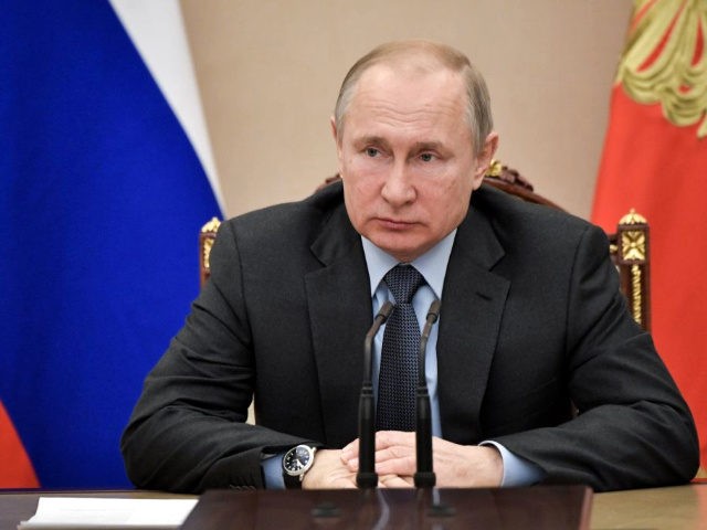 Russian President Vladimir Putin chairs a meeting with permanent members of the Security C