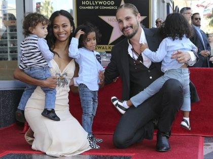 Zoe Saldana, second left, her husband Marco Perego, second right and their children, in no particular order, Bowie Ezio Perego-Saldana, Cy Aridio Perego-Saldana and Zen Perego-Saldana, pose at the ceremony honoring Zoe Saldana with a star at the Hollywood Walk of Fame on Thursday, May 3, 2018, in Los Angeles. …
