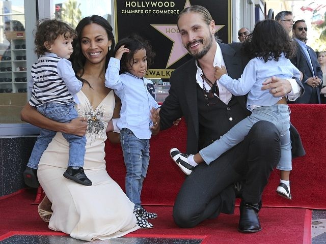Zoe Saldana, second left, her husband Marco Perego, second right and their children, in no