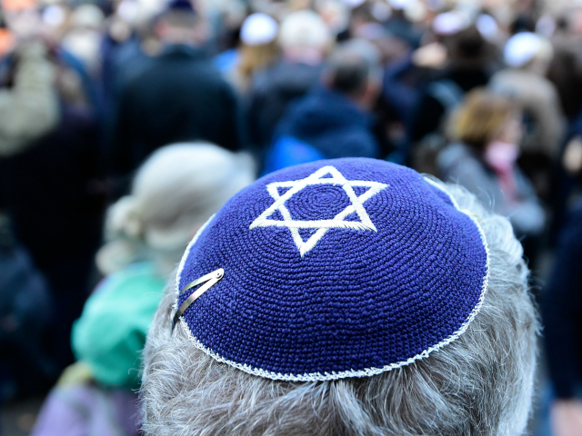 A participant of the 'Berlin wears kippa' rally wears a kippa in Berlin on April 25, 2018.