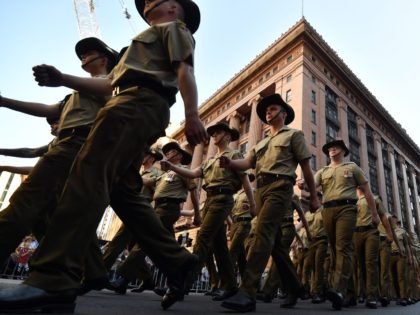 Participants march during the Anzac Day parade in Sydney on April 25, 2019. - Anzac Day ma